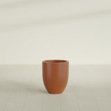 Valencia Tapered Round Planter in Matte Terra Cotta, 15"D × 18"H, shown empty