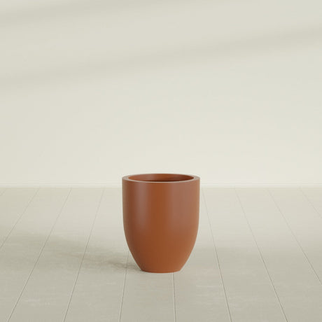 Valencia Tapered Round Planter in Matte Terra Cotta, 15"D × 18"H, shown empty