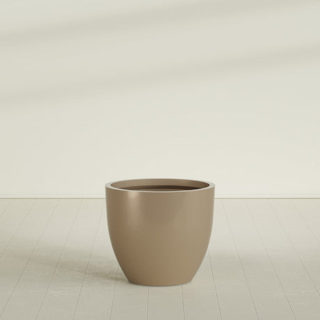 Wannsee Round Planter in Gloss Metallic Gold, 39"D × 34"H, shown empty