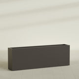 Hollywood Narrow Rectangular Planter in Matte Dark Brown, 72"L × 12"D × 24"H, shown empty