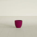 Wannsee Round Planter in Gloss Eggplant, 15"D × 13"H, shown empty