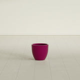 Wannsee Round Planter in Gloss Eggplant, 15"D × 13"H, shown empty