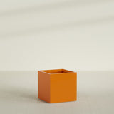Montroy Cube Planter in Gloss Tangerine, 32", shown empty