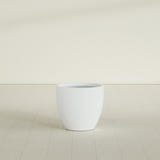 Wannsee Round Planter in Matte Bright White, 27"D × 24"H, shown empty