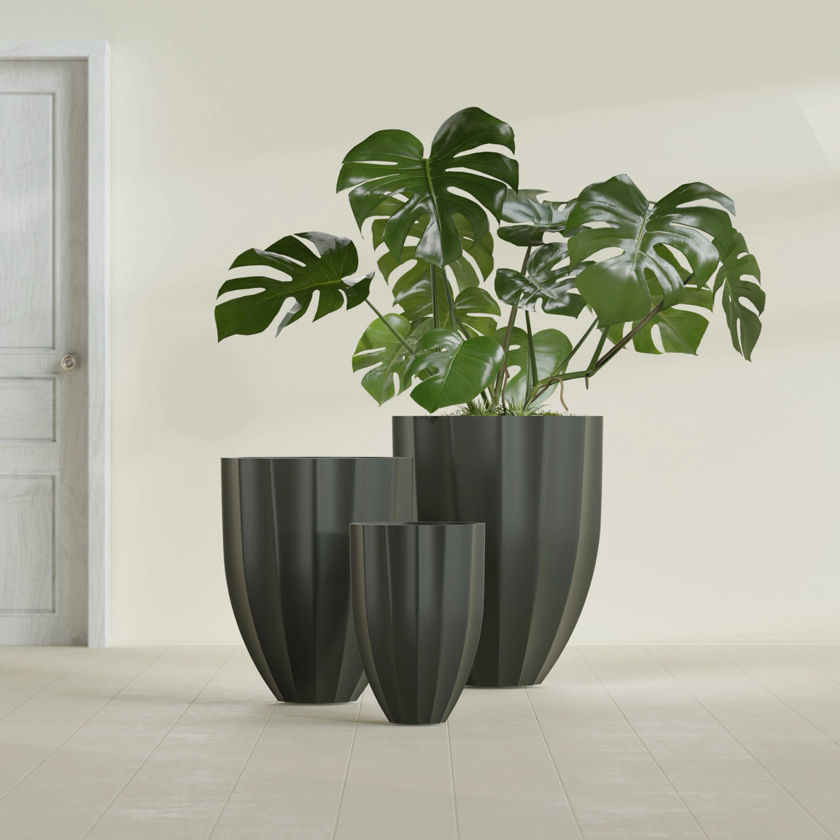 Alicante Fluted Planter in Matte Charcoal, 15"D × 21"H, shown empty