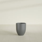 Valencia Tapered Round Planter in Matte Gunmetal, 15"D × 18"H, shown empty