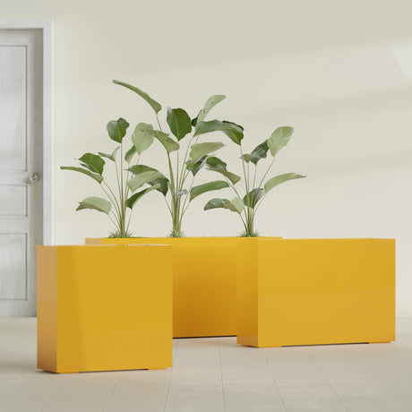 Milano Narrow Rectangular fiberglass planter in Gloss Saffron, shown planted, in a sunlit interior