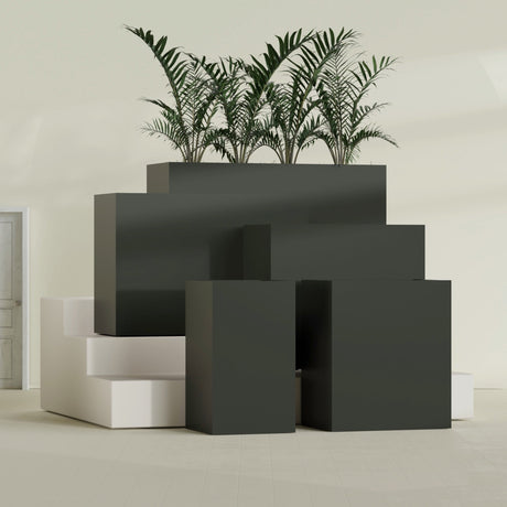 Darwin Rectangular fiberglass planter in Matte Charcoal, size range, in a sunlit interior