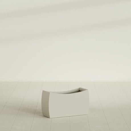 Seoul Curved Planter in Satin Beige, 32"L × 12"D × 18"H, shown empty