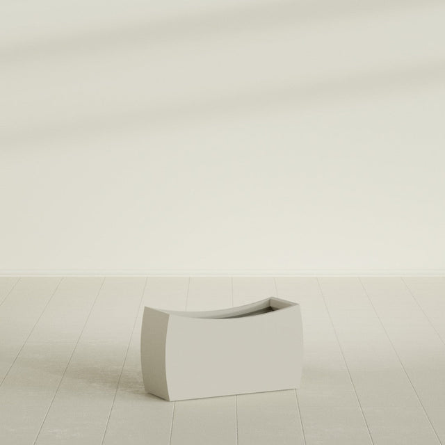 Seoul Curved Planter in Satin Beige, 32"L × 12"D × 18"H, shown empty