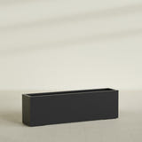 Miami Narrow Rectangular Planter in Matte Black, 60"L × 12"D × 18"H, shown empty
