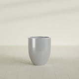 Valencia Tapered Round Planter in Metallic Silver, 20"D × 23"H, shown empty