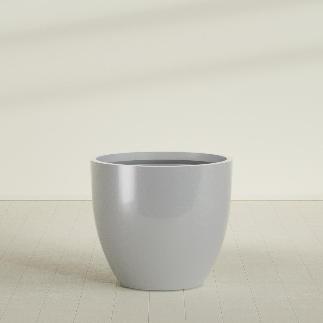 Wannsee Round Planter in Metallic Silver, 50"D × 44"H, shown empty