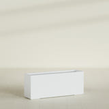Tolga Rectangular Planter in Gloss Bright White, 60"L × 16"D × 24"H, shown empty