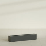 Salon Box Planter in Matte Charcoal, 42" Long, shown empty