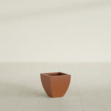 Lima Tapered Square Planter in Matte Terra Cotta, 12", shown empty