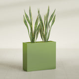 Perth Corner fiberglass planter in Satin Green, shown planted, in a sunlit interior