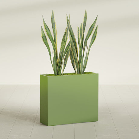 Perth Corner fiberglass planter in Satin Green, shown planted, in a sunlit interior