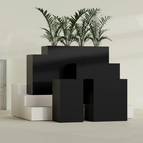 Darwin Rectangular fiberglass planter in Matte Black, size range, in a sunlit interior