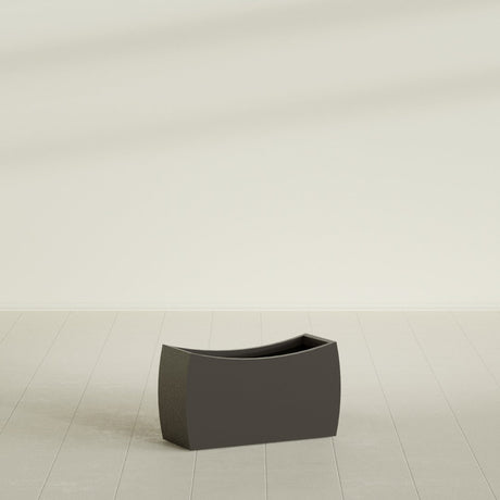 Seoul Curved Planter in Matte Dark Brown, 32"L × 12"D × 18"H, shown empty
