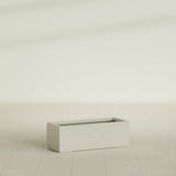 Cuba Low Rectangular Planter in Satin Beige, 36"L × 14"D × 12"H, shown empty