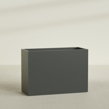 Darwin Rectangular Planter in Matte Charcoal, 60"L × 24"D × 42"H, shown empty