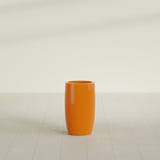Lisbon tall round tapered fiberglass planter in Gloss Tangerine, 14 in diameter, 25 in high, shown empty