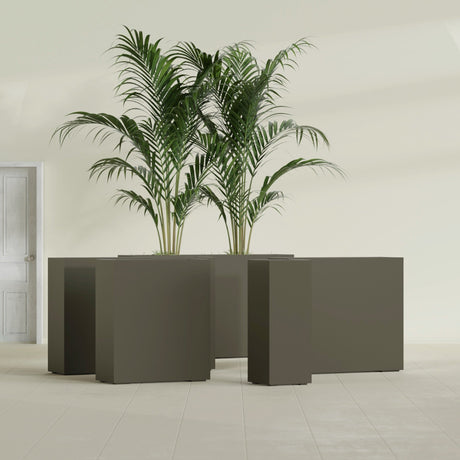 Perth Corner fiberglass planter in Matte Bronze, size range, in a sunlit interior