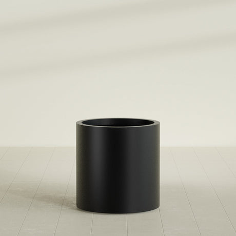 Rio Grande Cylinder Planter in Matte Black, 22"D × 22"H, shown empty