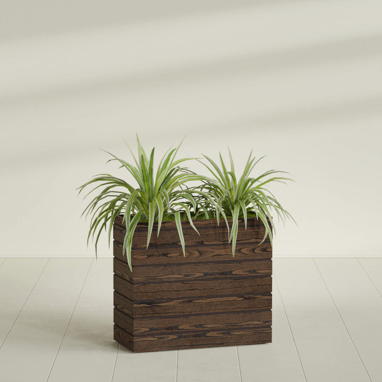 Sedona Tall planter in textured walnut, shown planted, in a sunlit interior