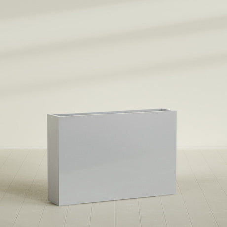Amesbury Narrow Rectangular Planter in Metallic Silver, 48"L × 10"D × 32"H, shown empty