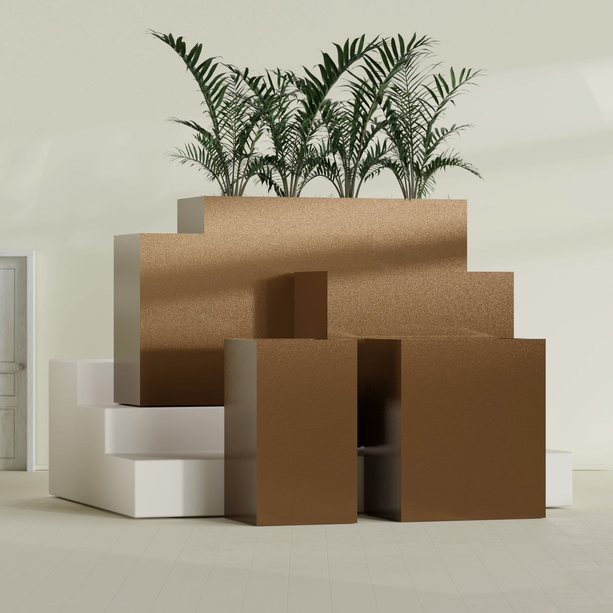 Darwin Corner fiberglass planter in Metallic Bronze, size range, in a sunlit interior
