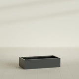 Antwerp Rectangular Planter in Matte Charcoal, 48"L × 24"D × 12"H, shown empty