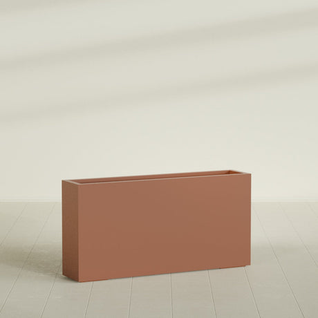 Milano Narrow Rectangular Planter in Matte Terra Cotta, 48"L × 10"D × 24"H, shown empty