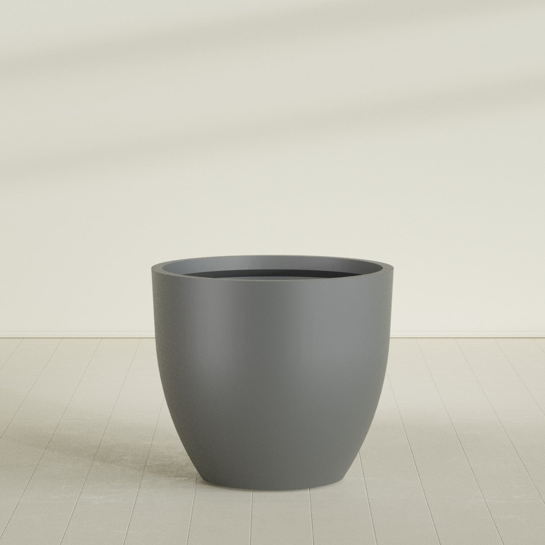 Wannsee Round Planter in Matte Gunmetal, 50"D × 44"H, shown empty