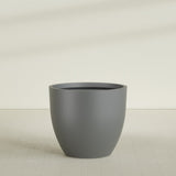 Wannsee Round Planter in Matte Gunmetal, 50"D × 44"H, shown empty
