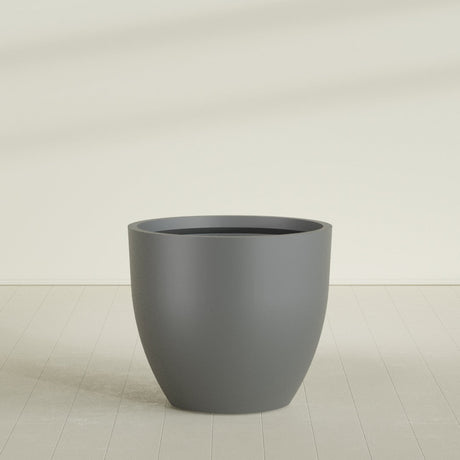 Wannsee Round Planter in Matte Gunmetal, 50"D × 44"H, shown empty