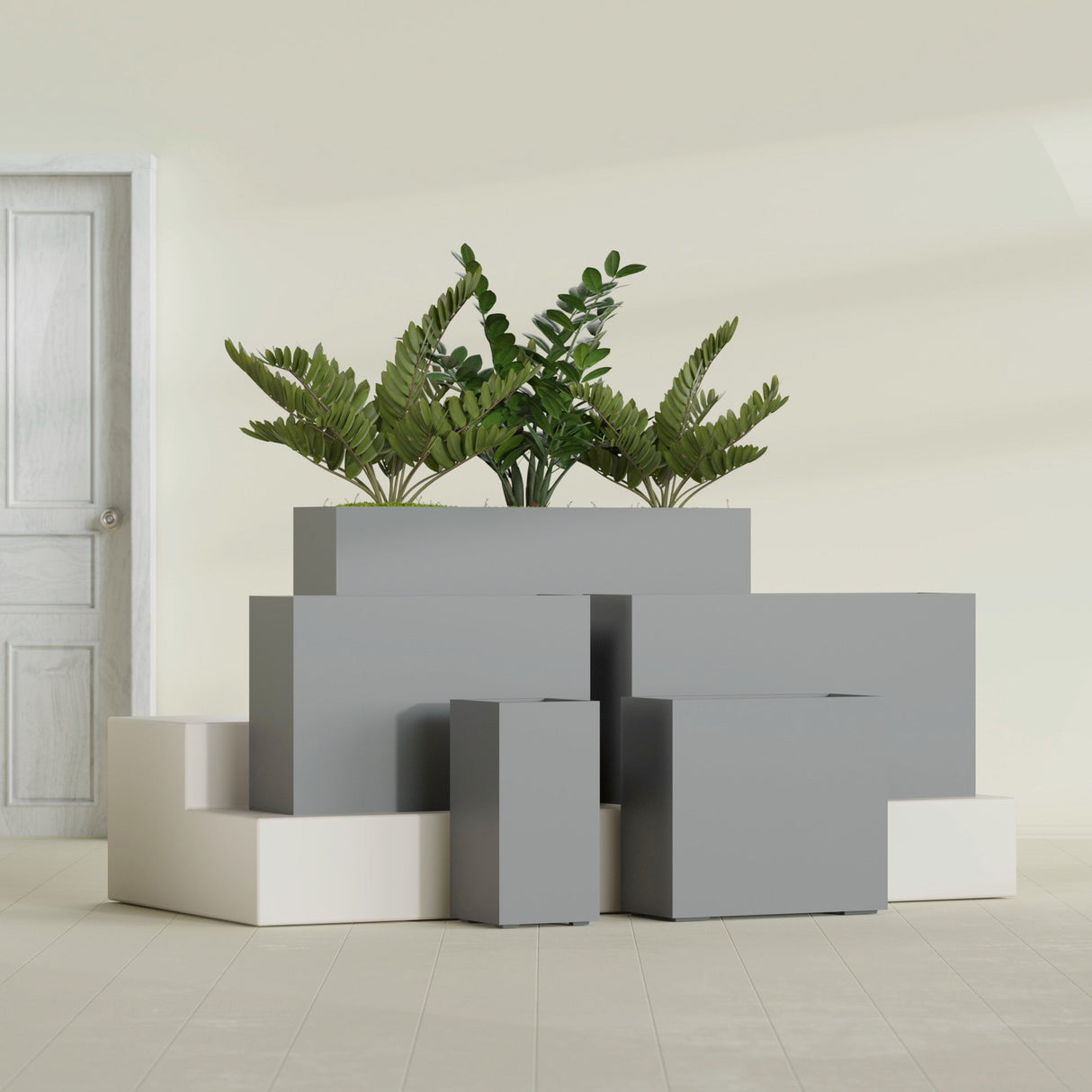 Potsdam Corner fiberglass planter in Matte Gunmetal, size range, in a sunlit interior