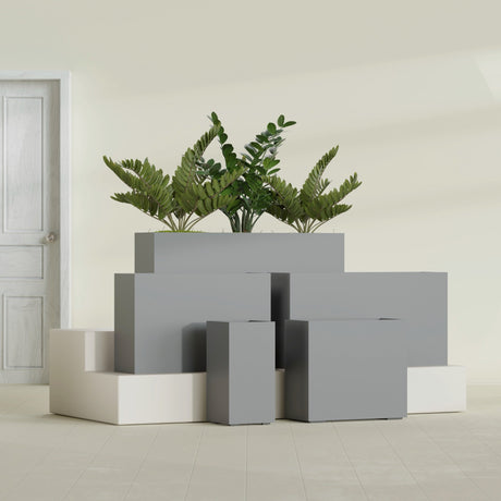 Potsdam Corner fiberglass planter in Matte Gunmetal, size range, in a sunlit interior