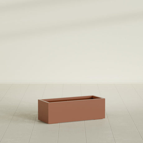 Cuba Low Rectangular Planter in Matte Terra Cotta, 36"L × 14"D × 12"H, shown empty