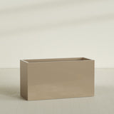 Brisbane Rectangular Planter in Gloss Metallic Gold, 60"L × 24"D × 32"H, shown empty