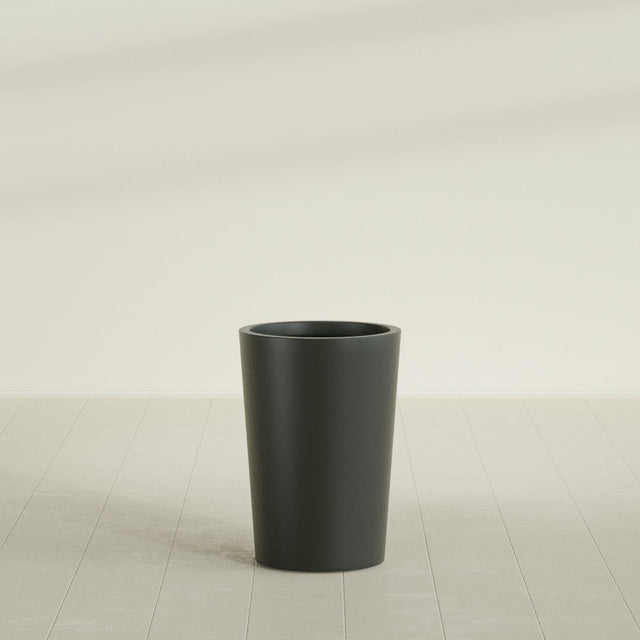 Tegel Round Tapered Planter in Matte Charcoal, 18"D × 26"H, shown empty
