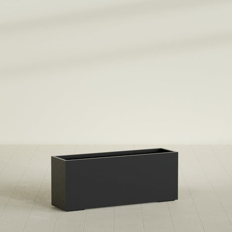 Tolga Rectangular Planter in Matte Black, 60"L × 16"D × 24"H, shown empty