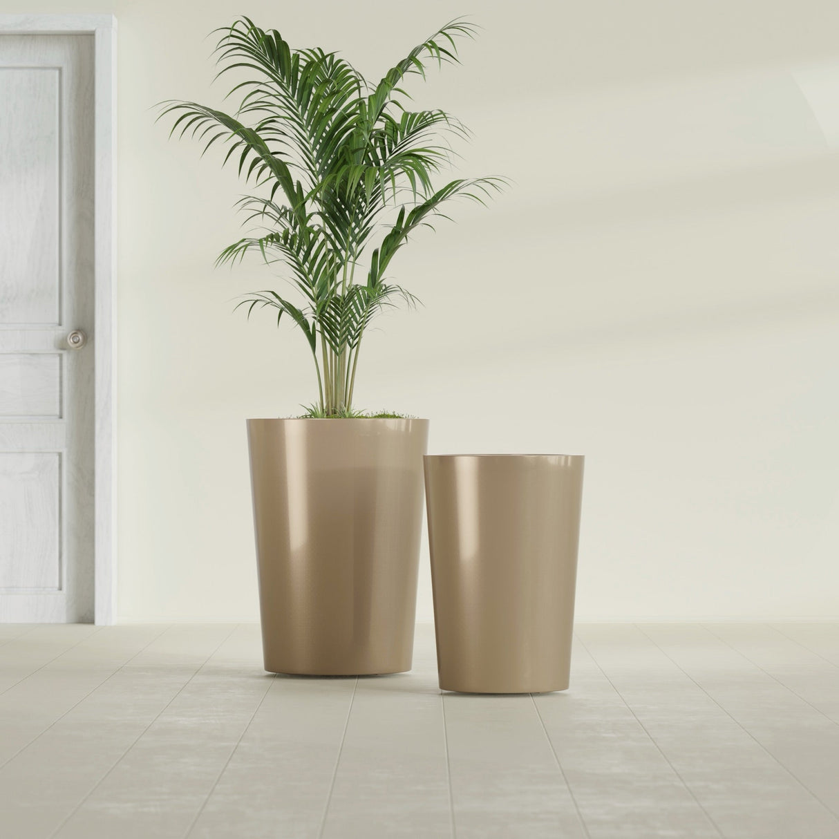 Tegel Round Tapered fiberglass planter in Gloss Metallic Gold, size range, in a sunlit interior