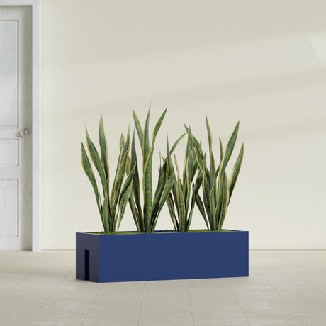 Tiergarden Railing fiberglass planter in Matte Cobalt Blue, shown planted, in a sunlit interior