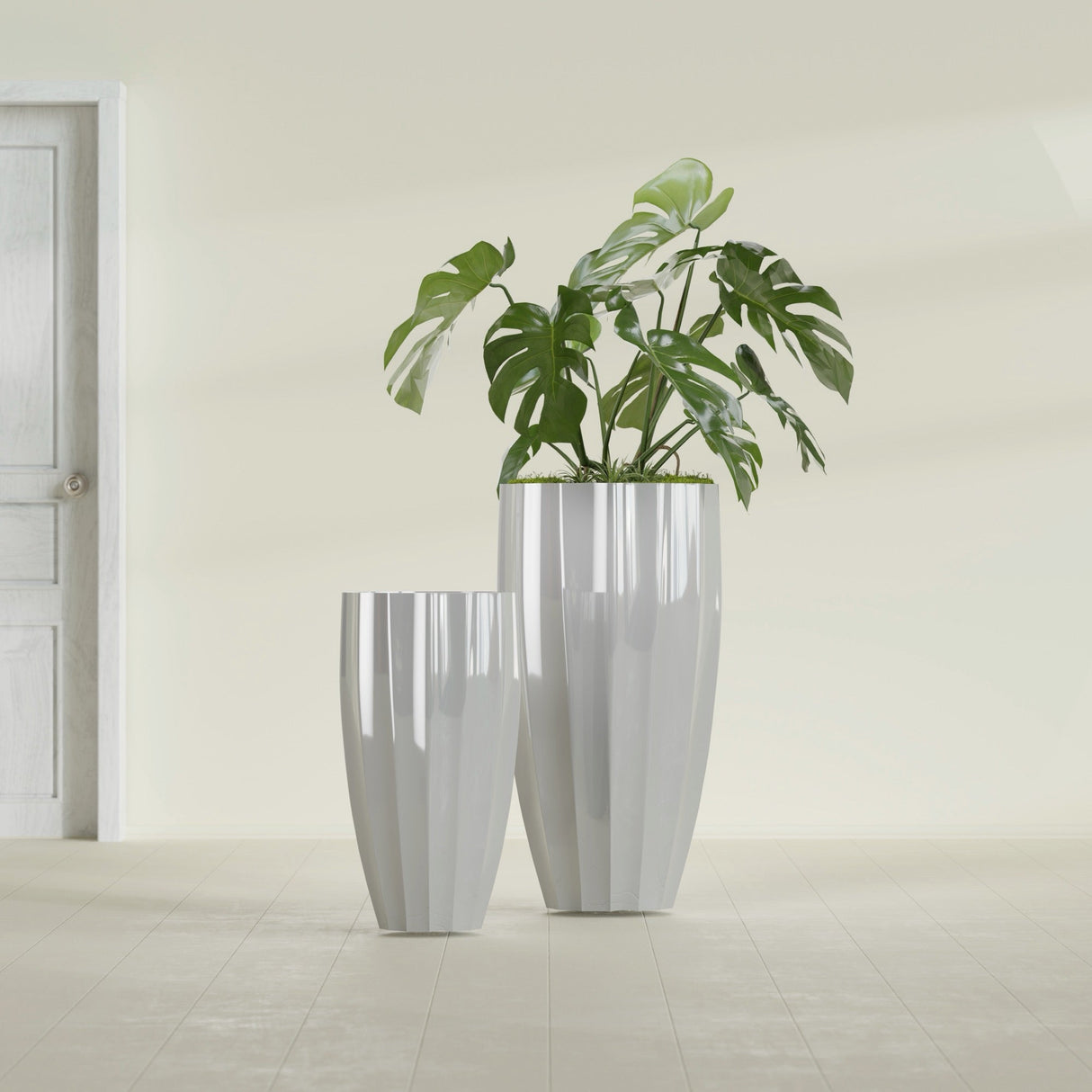 San Jose Tall Fluted fiberglass planter in Metallic Silver, size range, in a sunlit interior