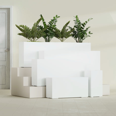 Hollywood Narrow Rectangular fiberglass planter in Gloss Bright White, size range, in a sunlit interior