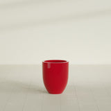 Valencia Tapered Round Planter in Gloss Red, 15"D × 18"H, shown empty
