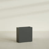 Milano Narrow Rectangular Planter in Matte Charcoal, 24"L × 10"D × 24"H, shown empty