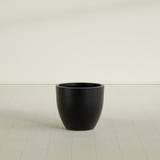 Wannsee Round Planter in Matte Black, 27"D × 24"H, shown empty